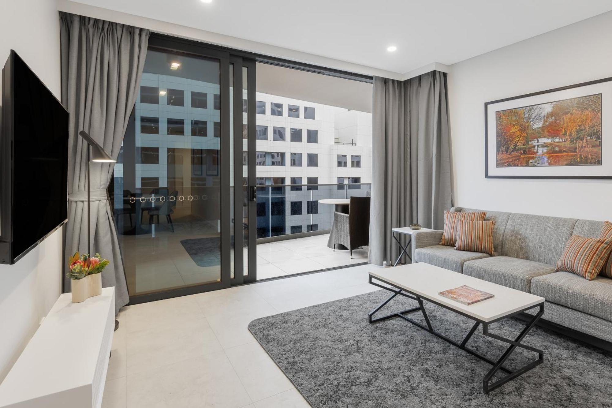 Meriton Suites كنبرا المظهر الخارجي الصورة Living room
