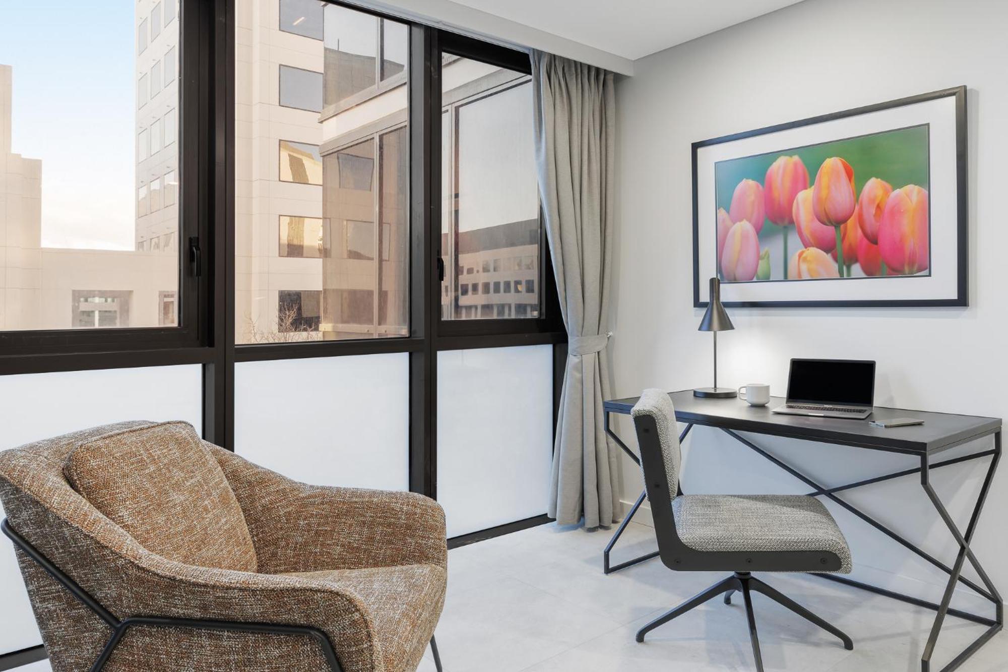 Meriton Suites كنبرا المظهر الخارجي الصورة A typical apartment at The Met